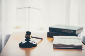 Scales, representatives of justice and gavel on the audio blog, objects and law books to work with the terms of the judges in the court of justice and law.