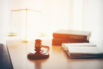 Scales, representatives of justice and gavel on the audio blog, objects and law books to work with the terms of the judges in the court of justice and law.