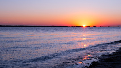 Ocean view at Dunedin Causeway in Dunedin, Florida, USA. Beautiful scenic seascape at sunset....