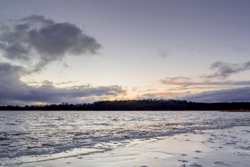 first ice on the lake in late autumn. Winter Coming Landscape