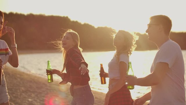 Girls on the hot summer party with beer