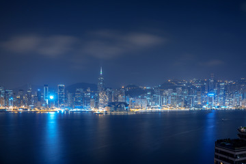 Fototapeta na wymiar Cityscape and skyline at Victoria Harbour in Hong Kong city at Night