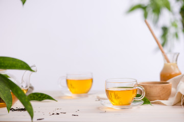 Dried tea leaves with tea pot