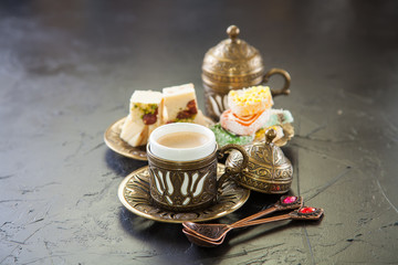 coffee and oriental sweets - locum and sherbet, selective focus, copy space