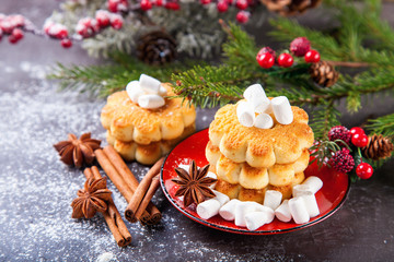 cookies about marshmallows and Christmas balls on a table, selective focus, copy space