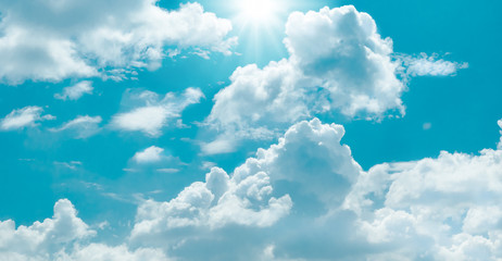 Blue sky and white clouds with sun background