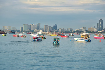 Pattaya Pier in the setting sun Beautiful atmosphere There are many boats that serve tourists at...