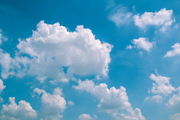 Naklejka na ściany i meble Deep blue sky and white cloud background.