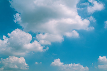 Naklejka na ściany i meble Deep blue sky and white cloud background.