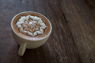 Cup of coffee with  latte art on top