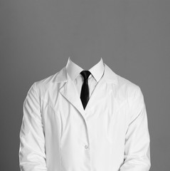 Doctor. A man in a white coat, white shirt and black tie. Without a face