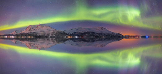 Fototapeta na wymiar Northern lights (Aurora borealis) in the sky over Tromso, Norway