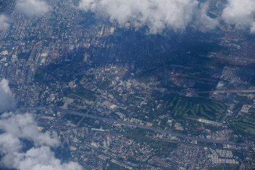 The aerial view of city through the cloud     