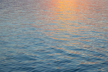 Waves and reflections before sunset