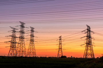 High voltage electricity tower sky sunset landscape,industrial background.