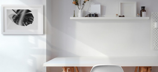 Minimal office room with white wooden empty table with copy space and decorations