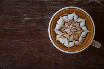 Cup of coffee with  latte art on top