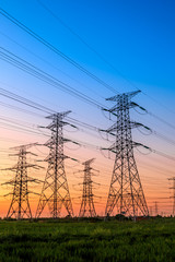 High voltage electricity tower sky sunset landscape,industrial background.