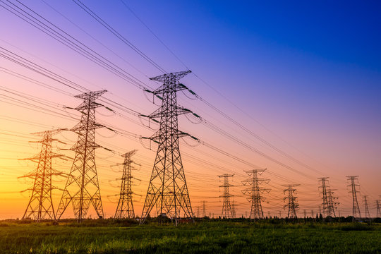 High voltage electricity tower sky sunset landscape,industrial background.