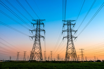 High voltage electricity tower sky sunset landscape,industrial background.