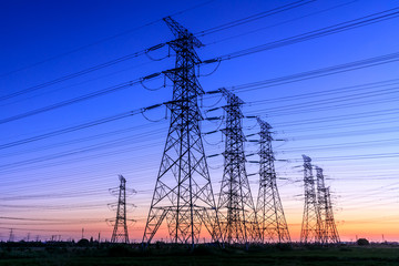 High voltage electricity tower sky sunset landscape,industrial background.