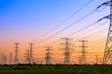 High voltage electricity tower sky sunset landscape,industrial background.