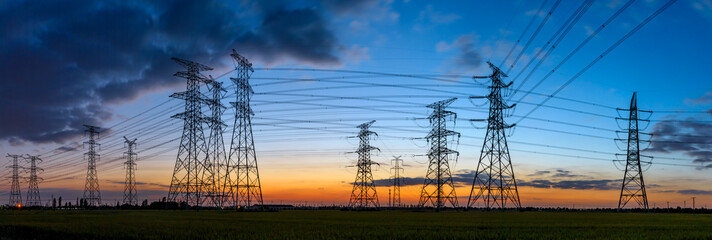 High voltage electricity tower sky sunset landscape,industrial background.