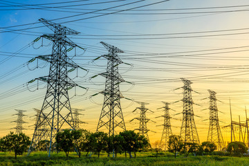 High voltage electricity tower sky sunset landscape,industrial background.