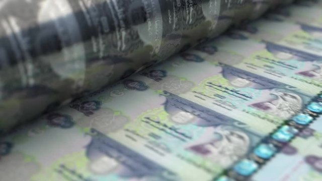 A loop able animation concept image showing a long sheet of Dubai Dirham notes going through a print roller in its final phase of a print run