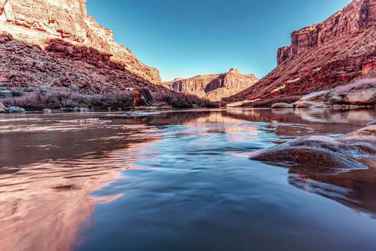 The Colorado River in Moab, Utah, USA between the mountain ranges of the West.