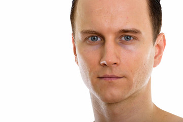 Fototapeta premium Studio shot of face of young handsome man shirtless