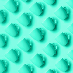 Duo tone pattern from mint cups over mint color background. Birthday party celebration, baby shower concept. Trendy green and turquoise color. Minimalist style design