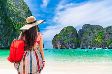 Lifestyle traveler woman in beach wear joy looking beautiful popular beach Maya bay Krabi, Famous landmark tourist people travel Phuket Thailand summer holiday vacation, Tourism destination place Asia