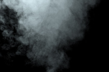 Abstract  powder or smoke isolated on black background