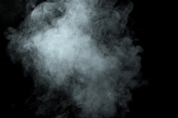 Abstract  powder or smoke isolated on black background