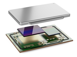 Disassembled processor into its component parts with chip cpu and gpu and open cover heat distributor.