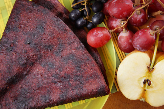 Tasty fruit pastille made of grape and apples. Healthy dietetic food