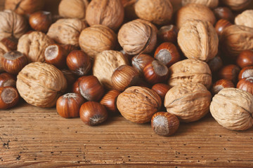  Nuts mix on rustic wooden background