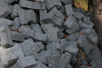 Heap of nice cobblestones, unloaded at a construction site.