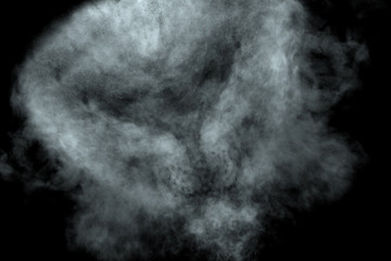 Abstract  powder or smoke isolated on black background