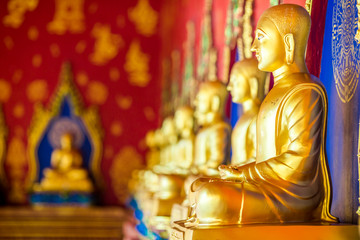 Obraz premium The beautiful sculpture background of, Wat Bang Thong, surrounded by trees, has a large area, is a religious tourist attraction in Krabi, with tourists always visiting, Thailand