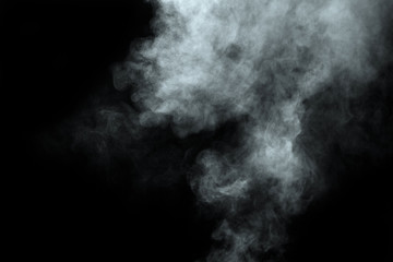 Abstract  powder or smoke isolated on black background