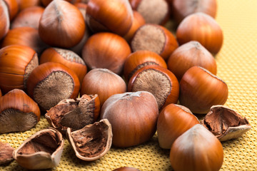 close up of hazelnuts on table .