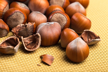 close up of hazelnuts on table .