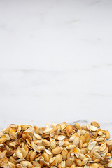 roast Pumpkin seeds background, flat lay