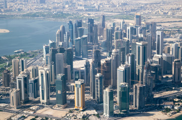 Aerial View of Modern Skyscrapers and Apartment Buildings in Downtown Doha (West Bay) on a Sunny Clear Day - Doha, Qatar - obrazy, fototapety, plakaty
