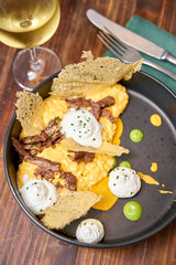 Dinner in restaurant. Pumpkin Risotto with with duck and parmesan cheese mousse. Seasonal autumnal recipe - risotto with organic pumpkins.