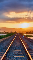 Fototapeta na wymiar Railway at sunset, beautiful moment