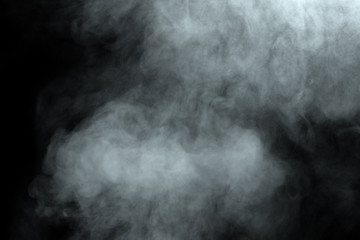 Abstract  powder or smoke isolated on black background