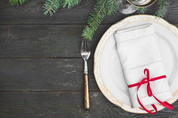 Black wooden table with stylish Christmas table setting